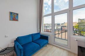 Mini Loft 1 BD Apt by Hostlovers